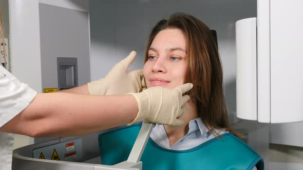 Doctor Radiologist in Dental Clinic Adjusting Female Patient Head Before MRI Procedure, Dental