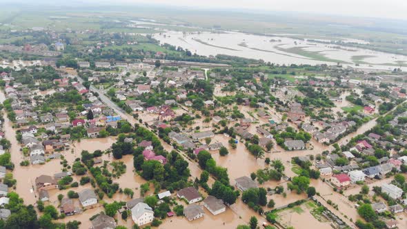 Aerial View City Is Flooded By a Big River. A River That Overflowed During the Rains and Flooded a