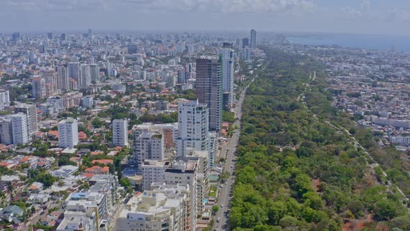 Avenida Anacaona at Santo Domingo city. Aerial forward panoramic view