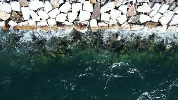 Waves on Rocks Drone View