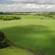 Flight Over Landscape with Fields in June in Russia - VideoHive Item for Sale