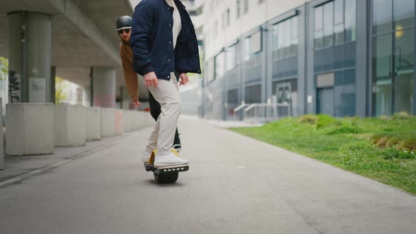 Close Up Leg Shot of a Skaters with Electric Skateboard