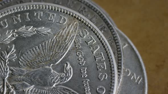 Rotating stock footage shot of antique American coins 