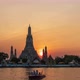 Wat Arun Ratchawararam (Temple of Dawn), Bangkok, Thailand; day to night, zoom out - time lapse - VideoHive Item for Sale