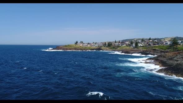 Aerial footage of Keleula Head near Kiama in regional New South Wales in Australia