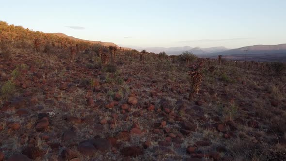 Dry Karoo farm landscape with Graaff-Reinet located on the horizon. Shot during drought featuring Ca