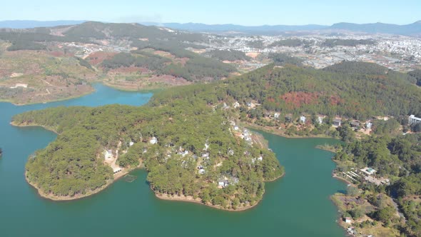 Unique aerial view of awesome Tuyen Lam Lake Da Lat plateau Vietnam forest hill highlands farmland c