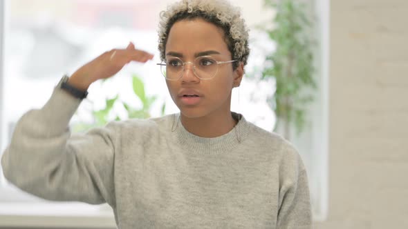 Portrait of African Woman Looking Around Searching