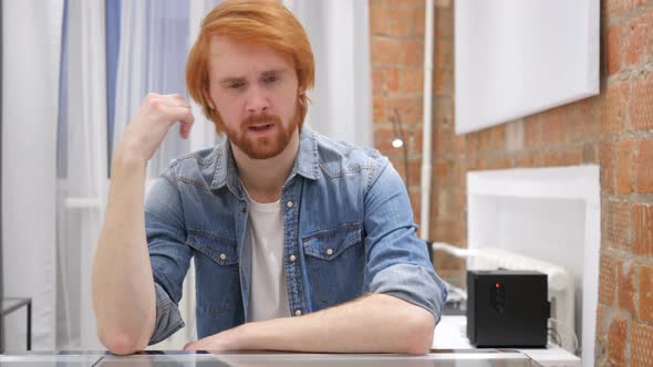 Tired Redhead Beard Man Yawning in Office