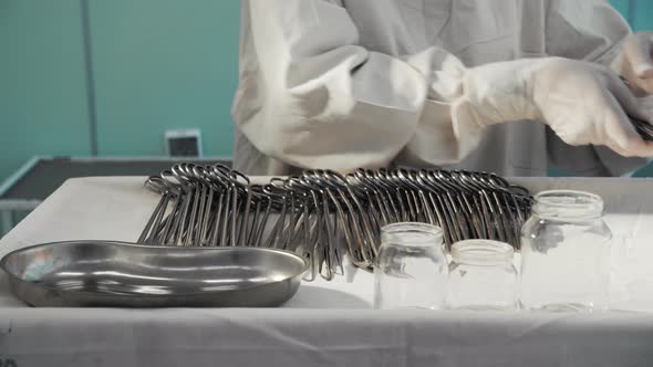 Nurse Preparing Sterile Surgical Instruments Healthcare Worker Prepares Tools