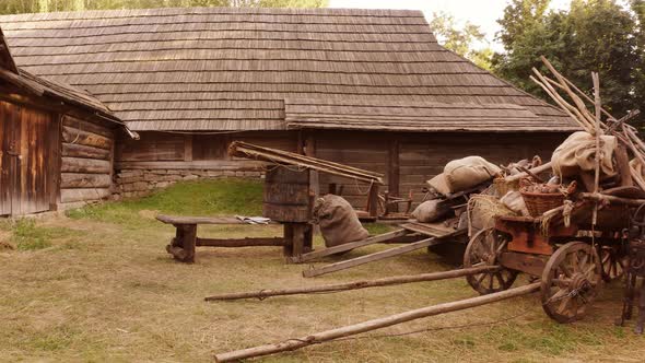 Peasant Countryman Stuff Beside His Wooden House