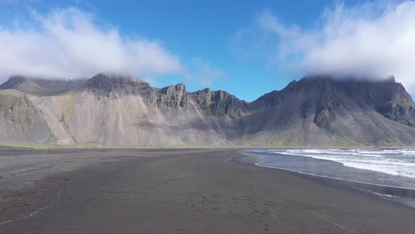 Flying Over a Sandy Beach on the Atlantic Ocean Coast. Waves Washing the Shore, Hofn, Iceland.