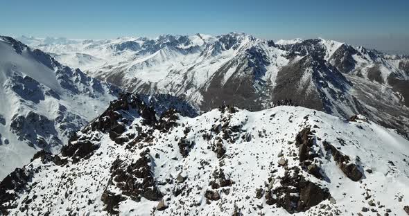 Top View of a Group of Tourists on a Peak