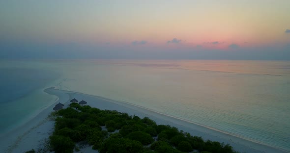 Luxury above abstract view of a white paradise beach and aqua turquoise water background in high res