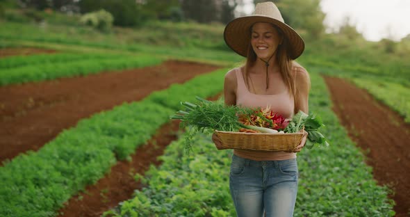 Woman holding organic vegetables