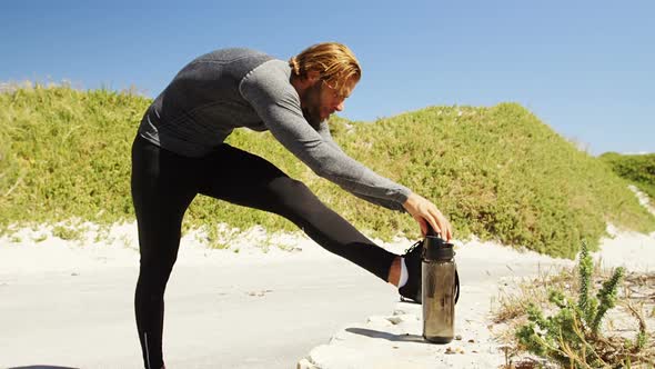 Triathlete man exercising on a sunny day