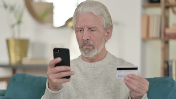 Excited Old Man Enjoying Online Shopping on Smartphone