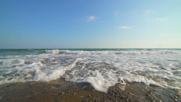 Shallow Rocky Reef Between the Sea and the Beach