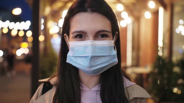 Young Hispanic Woman Wearing Protective Mask Against COVID Virus Tourist with Medical Mask Public