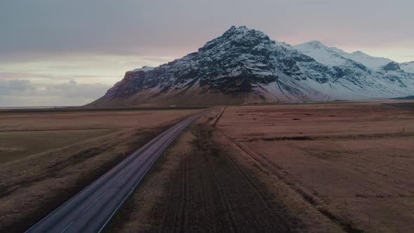 Straight road in cold valley