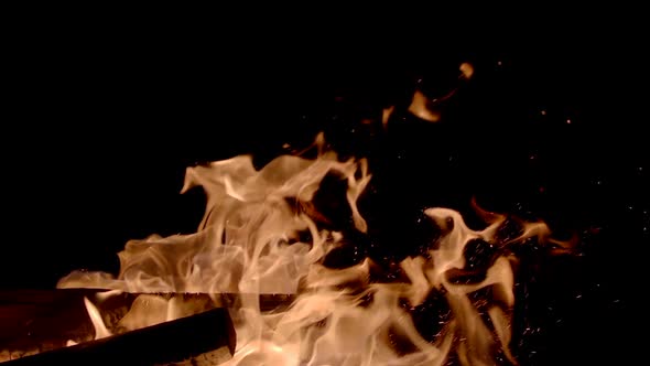 Close-up: super slow motion of fire line isolated on black background