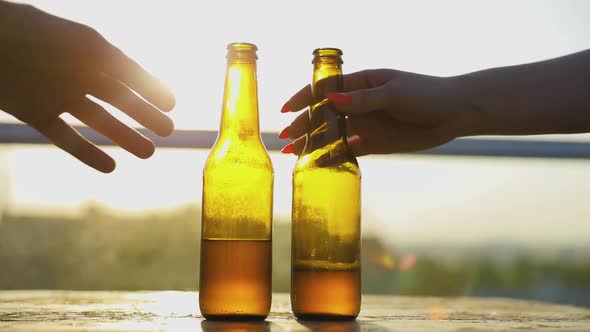 Beer Bottles On Table Closeup With Sunlight On Background