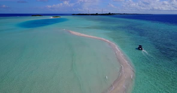 Luxury flying abstract view of a white paradise beach and aqua blue ocean background