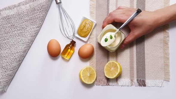 Homemade Mayonnaise Sauce. Ingredients Mustard, Eggs, Olive Oil. Top View Flat Lay