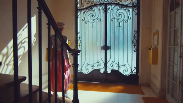 Attractive girl in the porch, Paris