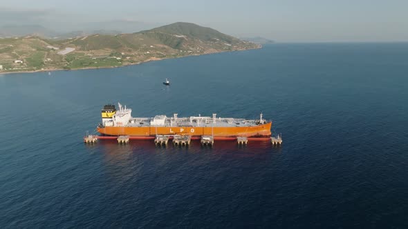 A gas tanker is anchored at sea aerial view 4 K