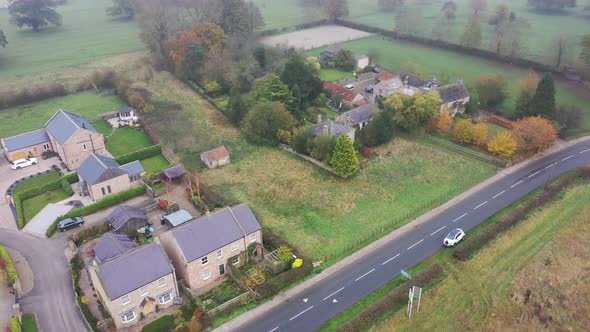 Aerial footage on a very foggy day of the village of Wetherby in Leeds West Yorkshire in the UK 