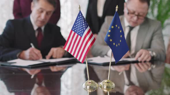 US And EU Diplomats Signing Cooperation Agreement