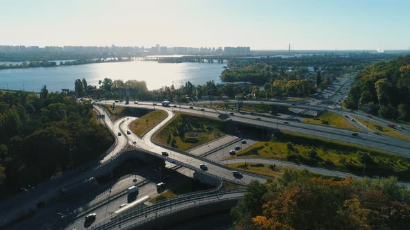 Aerial Drone Footage. Flight Over the Road Junction, Wide Shot at Autumn