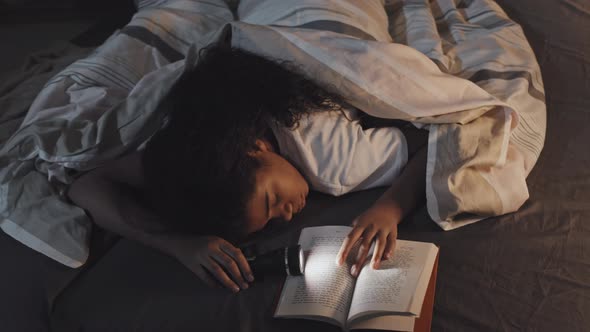 Girl Sleeping with Book