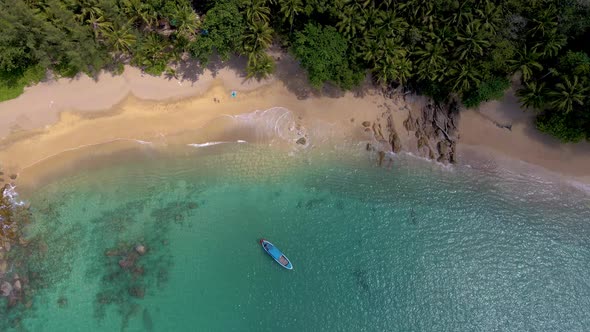 Banana Beach Phuket Thailand White Sandy Beach with Palm Trees View From Drone Aerial View at Beach