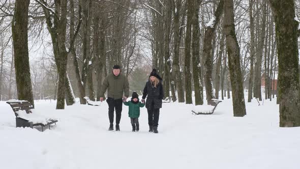 International Family Walking Along the Alley