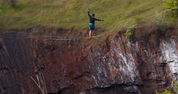 Balancing on a Rope Over a Massive Pit Amazing Courage of a Man