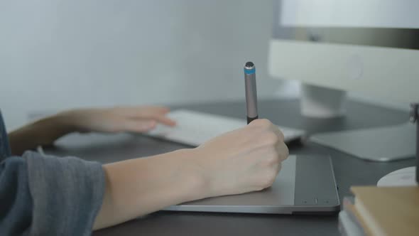 Graphic Designer Working With Tablet Pen