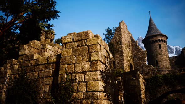 Ancient Castle at Sunrise with Mountains in Background