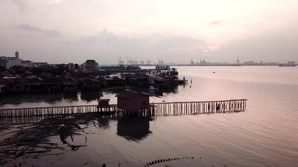 Tan Jetty with background Georgetown water home for chinese