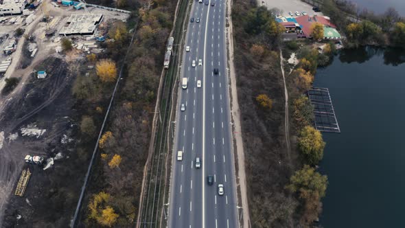 Aerial View of Cars Driving Along Highway