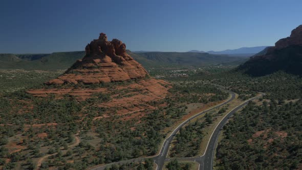 Aerial view of the Bell Rock and a road alt