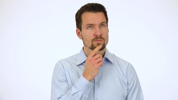 A Young Handsome Man Thinks About Something - White Screen Studio