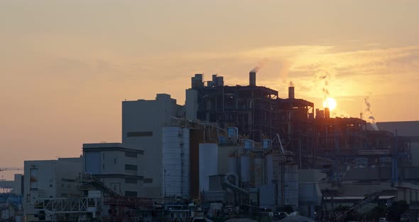 power station at sunset