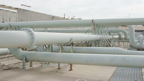 Oil and gas pipes and valves at a large oil refinery