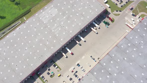 Aerial Shot of Logistics Center with Trucks