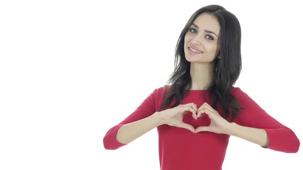 Handmade Heart Sign by Young Woman, White Background