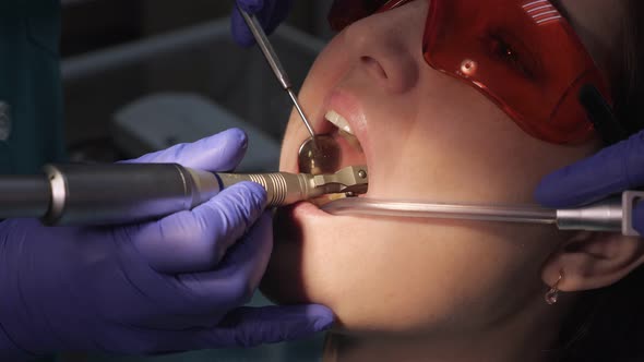 Young Woman on Preventive Examination in Dental Chair at the Dentist