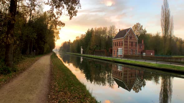 Panoramic View of the River and Nature and the Setting Sun in the Water