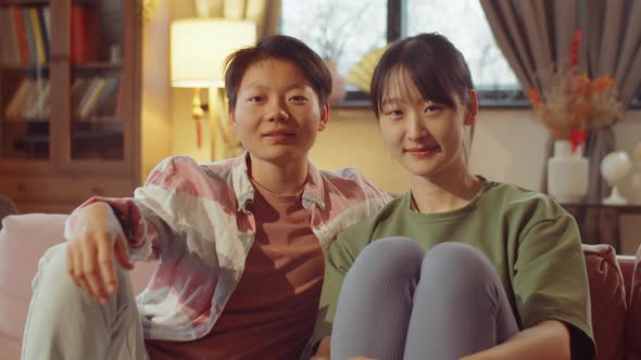 Portrait of Asian Lesbian Couple at Home